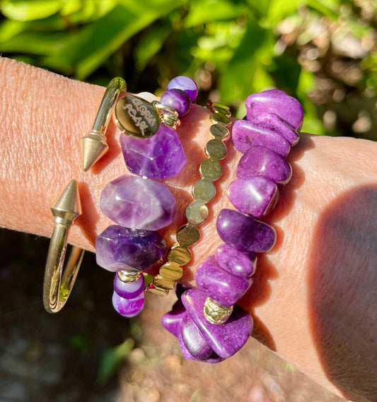 Amethyst stones for February birthday. Beautiful purples accented with gold.