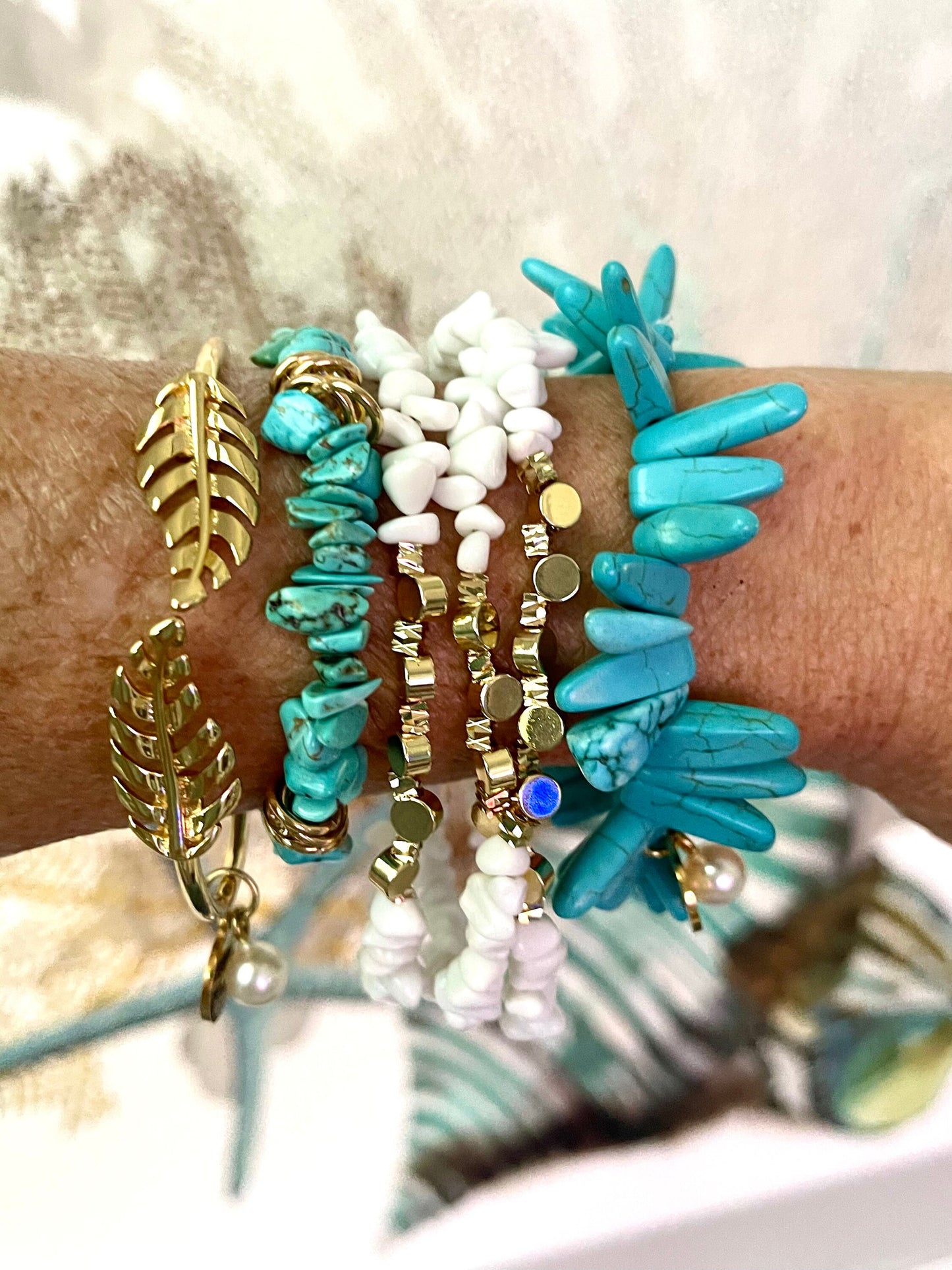 Beautiful teal blue howlite slice bracelets with white ware stone triple strand adjustable bracelet and gold leaf cuff