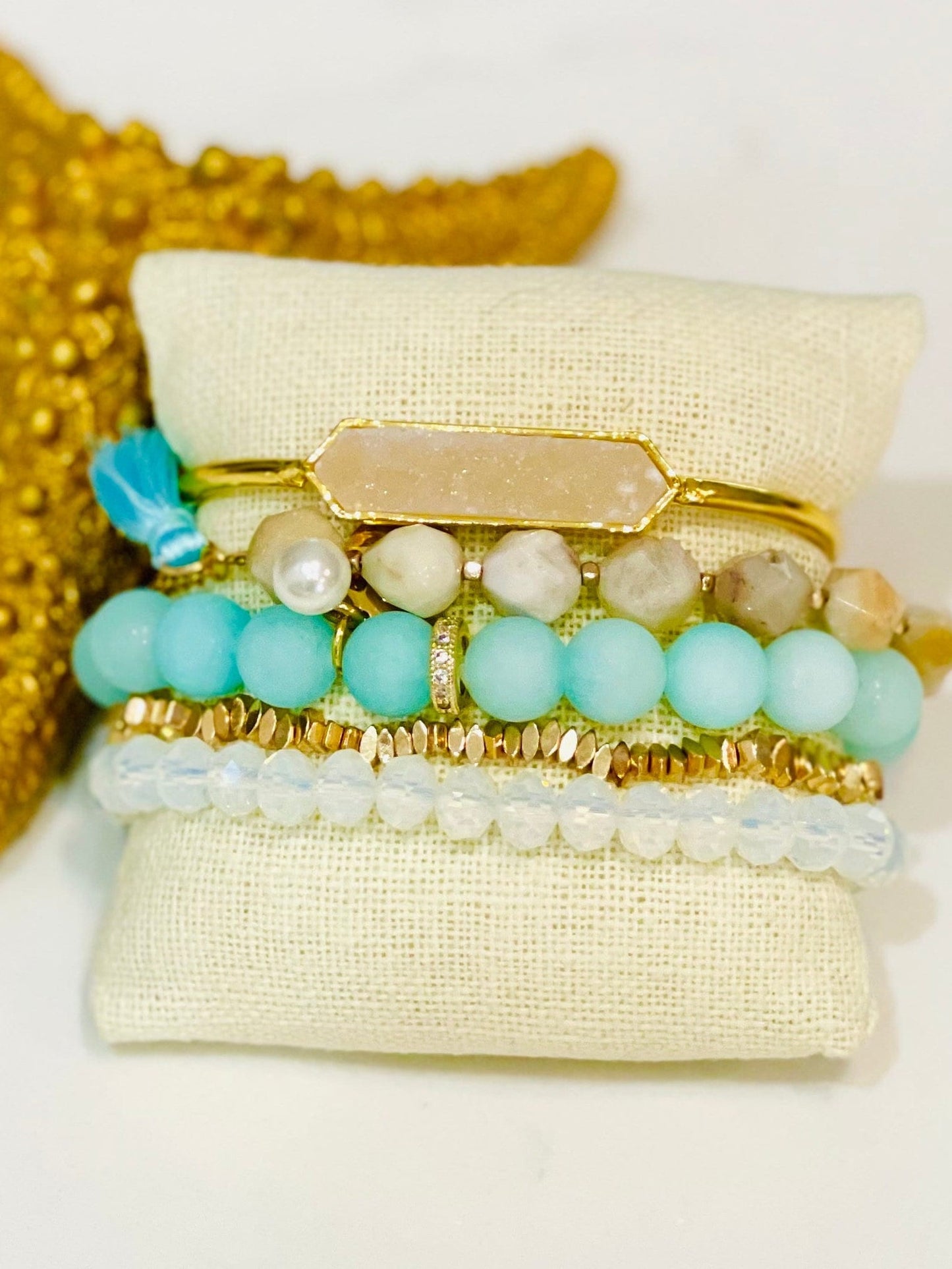 Druzy quartz cuff with blue chalcedony beads and gold bracelets